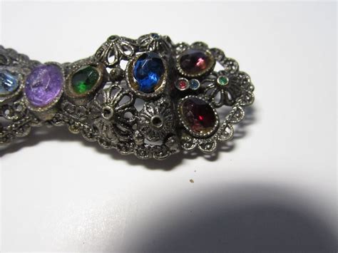 Vintage 1930s Bow Pin In Silvertone With Multiple Colored Crystals