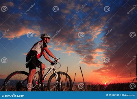 Man With Bicycle At The Sunset Outdoor Stock Photo Image Of Dawn