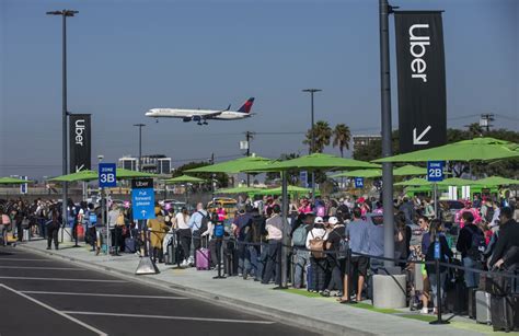 After A Chaotic Week Lax To Expand Uber Lyft And Taxi Pickup Lot