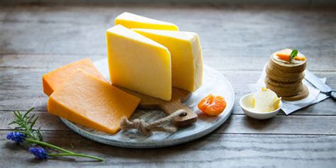 A full stock cheese board will keep your guests entertained and delighted while you're in the kitchen preparing the main meal. finest hard cheese selection by cows and co ...