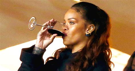 Rihanna Carries A Wine Glass Wherever She Goes 15 Iconic Rihanna Moments Rolling Stone