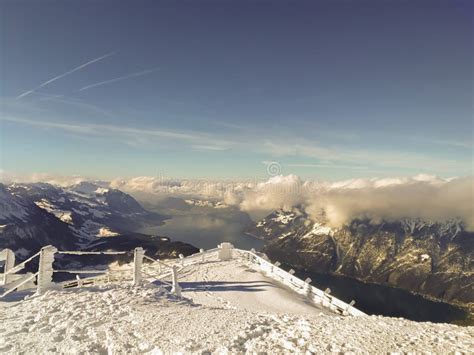 Swiss Mountain Peak After Snowfall With Panoramic View Of Lake Lucerne