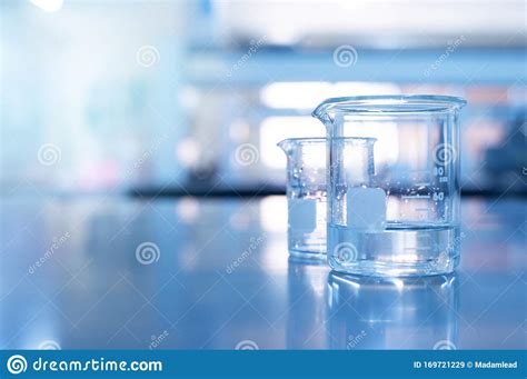 Glass Beaker With Water In Education Chemistry Blue Science Laboratory Stock Image Image Of
