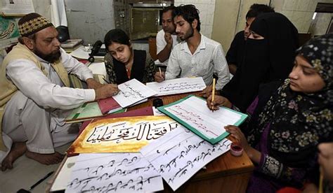 Students Learn To Write Urdu Calligraphy At Urdu Academy In Delhi