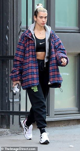 Dua Lipa Flaunts Her Abs In Sports Bra And Quirky Tracksuit Bottoms While Stepping Out Make Up