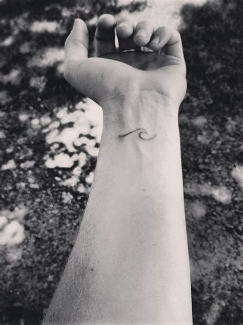 If this is your preferred style, get a black sleeve. Black and white wave tattoo