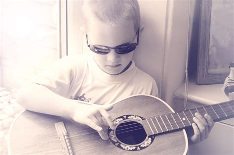 Little Boy Playing Guitar Free Stock Photo Public Domain Pictures