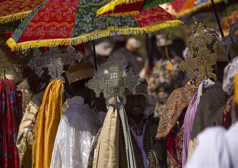 Ethiopian Orthodox Priests Holding Sacred Crosses During The Colorful
