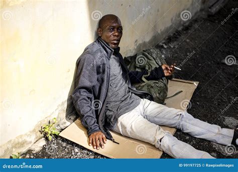African Men Homeless Sitting On The Roadside Stock Image Image Of