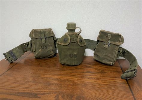 Original Vietnam Era Us Army Field Gear Canteen And Ammo Pouches And Belt