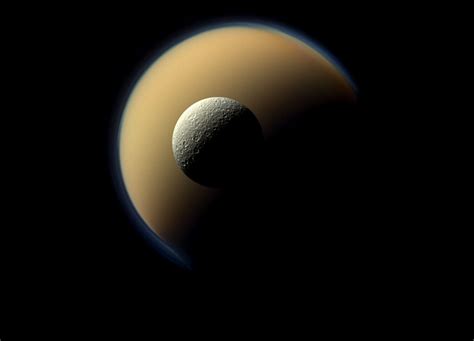 Rhea And Titan As Seen By Cassini Spaceref