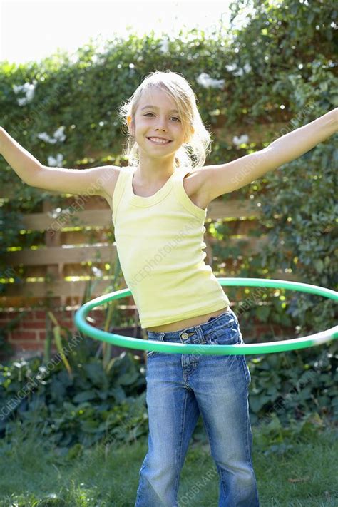 Girl Playing With A Hula Hoop Stock Image F0025873 Science Photo