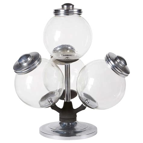 Glass candy jars manufacturer for more than 15 years. Revolving 4 Piece Argentinean Vintage Glass Iron Candy Jars