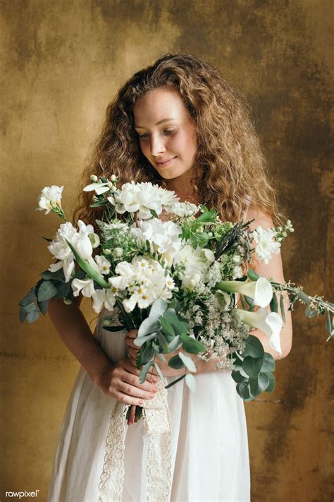 Download Premium Image Of Woman Holding A Bouquet Of White Flowers By Teddy About Florist Girl