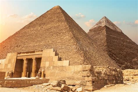 Mastaba Of Seshemnefer Iv And The Pyramid Of Cheops In Giza Stock Photo
