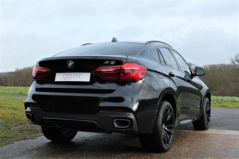 Suvs are tall, designed to comfortably carry a family and maybe tow a small boat. BMW X6 30d M Sport - GKirby Collection