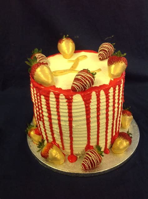 frosted drip cake with strawberries dipped in gold strawberry dip strawberry cakes drip cakes
