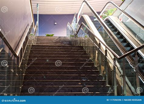Stylish Stairs And A Escalator Lift Of A Shopping Mall Unique Photo