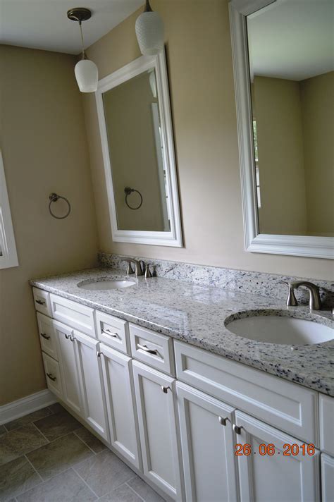 Guest Bathroom With Double Sinks And Granite Counter Tops Double