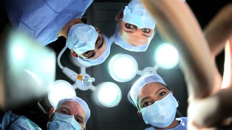 Patient Point Of View Male Female Surgeons Nurses Wearing Surgical