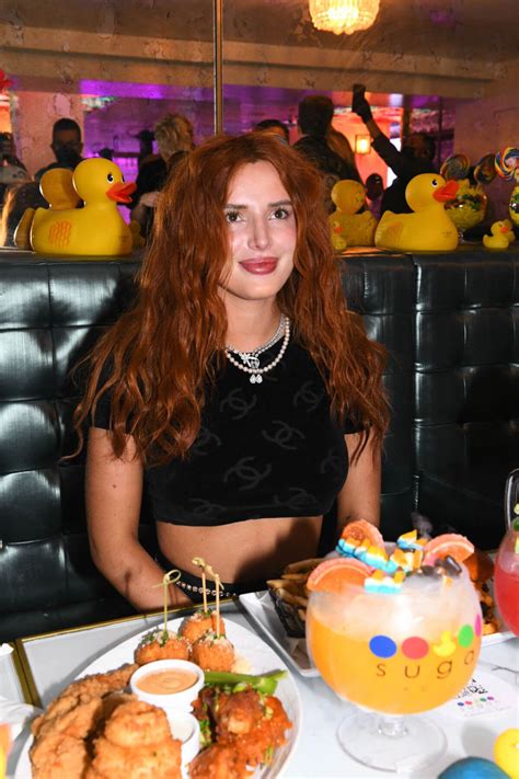 bella thorne flashes her toned midriff in crop top as she hosts dj set and listening party at