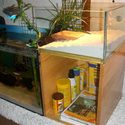 A turtle above tank basking platform is a must have item for anyone who is thinking about or is currently owned by a delightfully goofy pet turtle. turtle water tank idea - storage ideas | Turtle tank ...