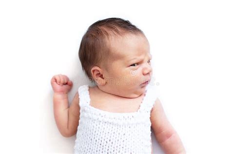 Newborn Baby Emotions White Background Funny Face Of A Child