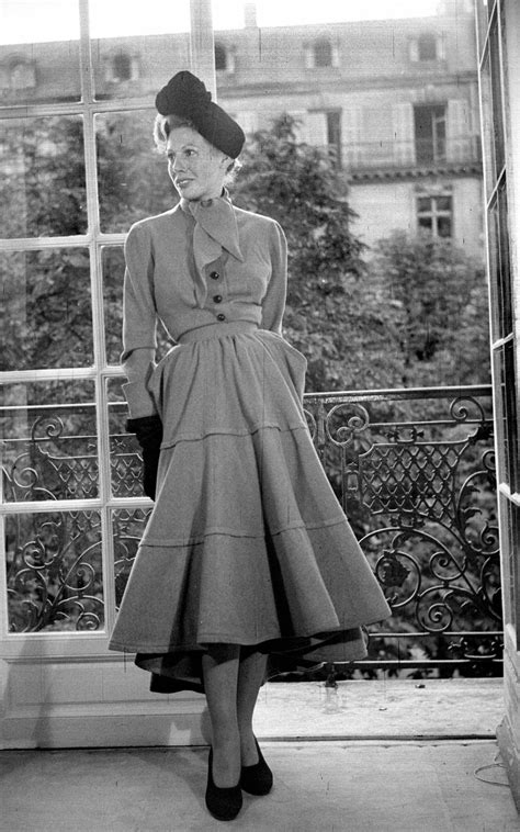 A Model Wearing The Dior Couture New Silhouette In 1947 In Paris