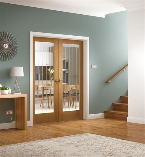 Search all products, brands and retailers of glass doors: Suffolk Etched Glass Door Pair - Oak Warehouse