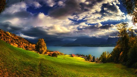 Фотографии Швейцария Oberhofen осенние Природа Луга Небо 1920x1080