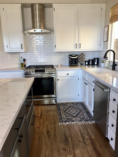 How to build your own kitchen cabinets with 2x4s and 1x4s and a little paint and hardware! Refinish your Kitchen Cabinets like a Pro - DIY Project