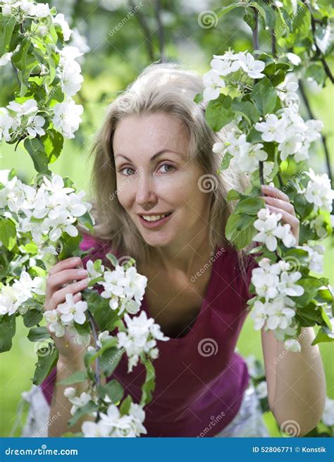 Young Attractive Woman Standing Near The Blossoming Apple Tree Stock Image Image Of Model