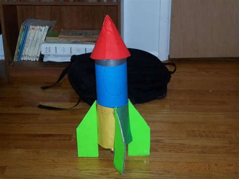 Begin to build a bottle rocket by shaping the balsa wood into fins. How to make a water rocket fly high? | Physics Forums