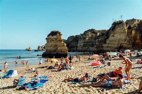 People Having Fun In Water And Relaxing In Lagos Ocean