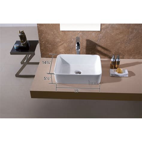 While it is rectangular, the edges are curved, which softens the overall look. Luxier Ceramic Vessel Bathroom Sink & Reviews | Wayfair