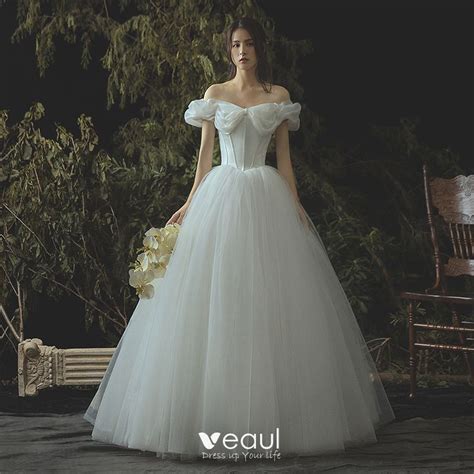 For a spring or summer wedding, choose lighter styles of lace and crochet lace with the subtle appearance of skin from beneath the fabric. Elegant Ivory Corset Wedding Dresses 2019 A-Line ...