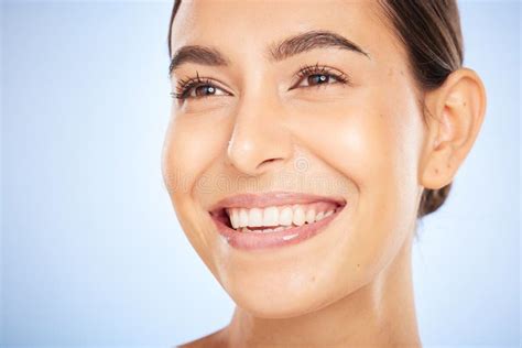 Skincare Model Face Smile And Beauty By Blue Background For Wellness