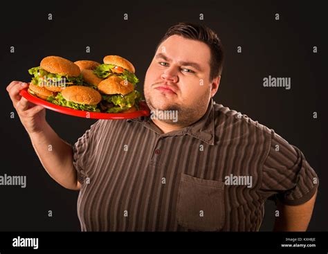 Fat Man Eating Fast Food Hamberger Breakfast For Overweight Person