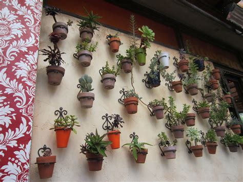 Wall of succulents | Planter pots, Succulents, Planters