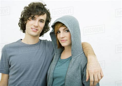 Young Couple Man With Arm Around Womans Shoulders Portrait Stock
