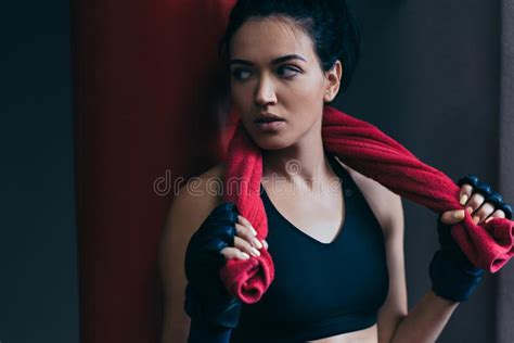 Cropped Portrait Of Sporty Attractive Brunette Woman With Red Towel On