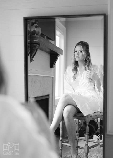 Beautiful Bride Getting Ready In Mirror Before Her Wedding Day Vezalay Wedding Carrie