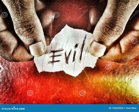 Evil The Word Written In Roughly Style On The Red And Fire Grunge