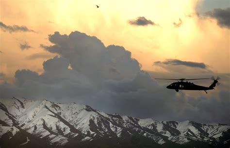 Photo Of Black Hawk Flying Over Afghan Mountains