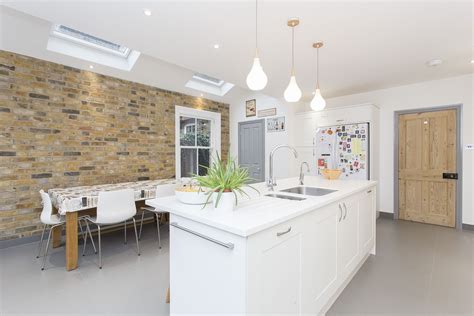 White Shaker Solent Kitchen With Island In A Kitchen With Exposed