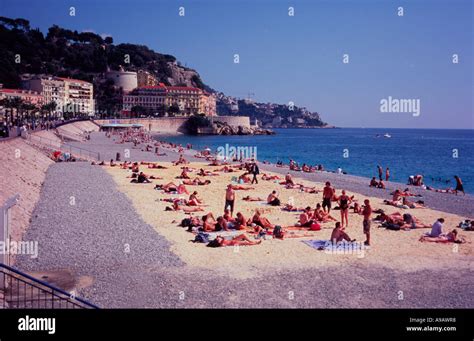 Sunbathers On Beach Nice France Hi Res Stock Photography And Images Alamy