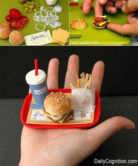 A Hand Is Holding A Tray With Food On It And The Other Has A Sandwich In It