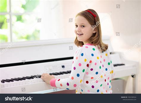 Child Playing Piano Kids Play Music Stock Photo 1955789524 Shutterstock