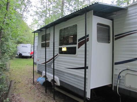 He went ahead and covered his storage. RV.Net Open Roads Forum: Travel Trailers: Slide awning in the rain | RV stuff | Pinterest | Rv ...