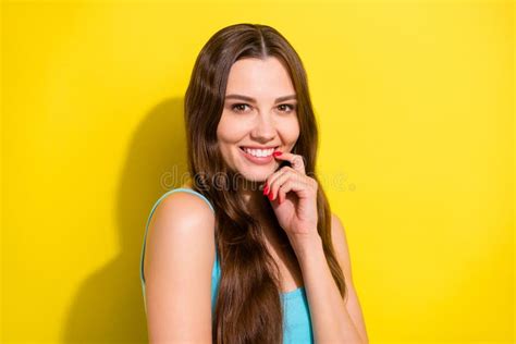 Photo Of Flirty Brunette Hairdo Young Lady Finger Mouth Wear Teal Top Isolated On Vivid Yellow